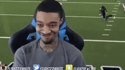 Man Sitting In Front Of Screen Saying Flight23white GIF
