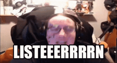 Man Sitting In Front Of Screen Saying Listeerrrn GIF