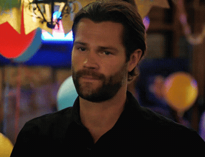 Man Sitting In Front Of Screen Saying Open GIF