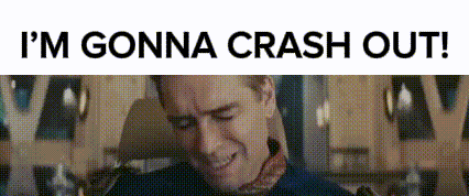 Man Sitting In Front Of Sign I'm Gonna Crash Out GIF