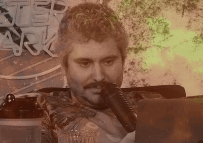 Man Sitting In Front Of Step Ark Sign GIF