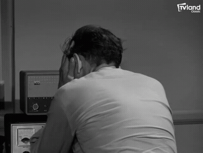 Man Sitting In Front Of TV Land Classic GIF