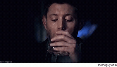 Man Sitting In Front Of UFC Sign GIF