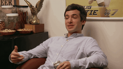 Man Sitting In Front Of Ug Tie Poster GIF