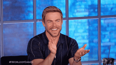 Man Sitting In Front Of Window With #Worldofdance On Shirt GIF