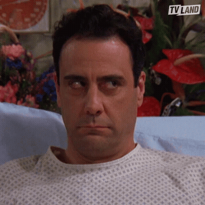 Man Sitting In Hospital Bed GIF