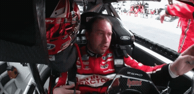 Man Sitting In Race Car Wearing Ford Shirt GIF
