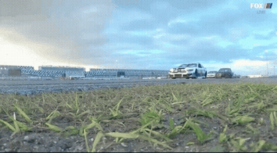 Man Sitting In Race Car Wearing Ford Shirt GIF