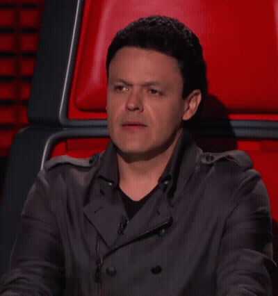 Man Sitting In Red Chair Laughing GIF