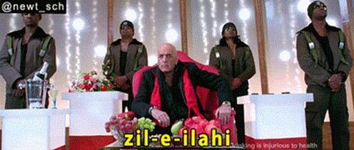 Man Sitting In Red Chair Zil-E-Ilahi GIF