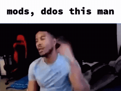 Man Sitting in Room With Mods Ddos This Man