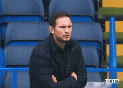 Man Sitting In Stadium With Word Heitse GIF