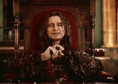 Man Sitting In Throne With Hands Folded GIF
