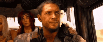 Man Sitting In Truck With Two Women GIF