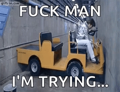 Man Sitting In Yellow Golf Cart GIF