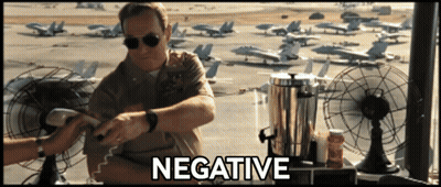 Man Sitting Near Planes Negative GIF