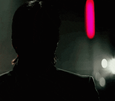 Man Sitting Next To Woman In Red Dress GIF