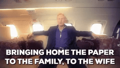 Man Sitting On Airplane With Outstretched Arms GIF