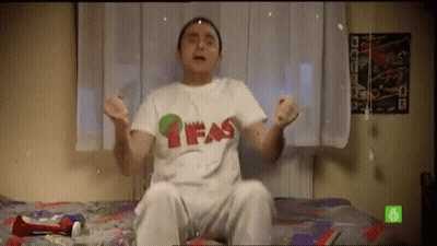 Man Sitting On Bed In White T-Shirt Saying Fas GIF