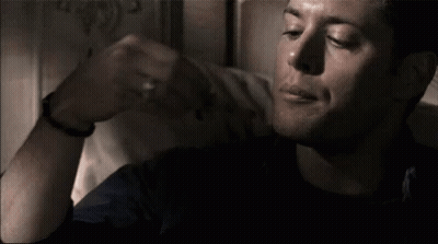 Man Sitting On Bed Making Funny Face GIF