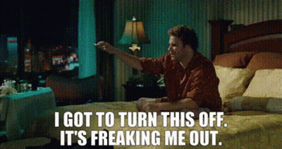 Man Sitting On Bed Saying I Got To Turn This Off It's Freaking Me Out GIF