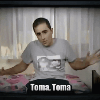 Man Sitting On Bed With Arms Outstretched T-Shirt Says Toma GIF