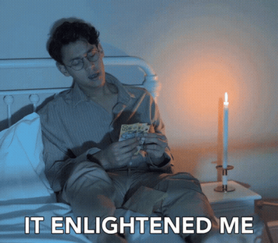 Man Sitting On Bed With Candle Saying It Enlightened Me GIF