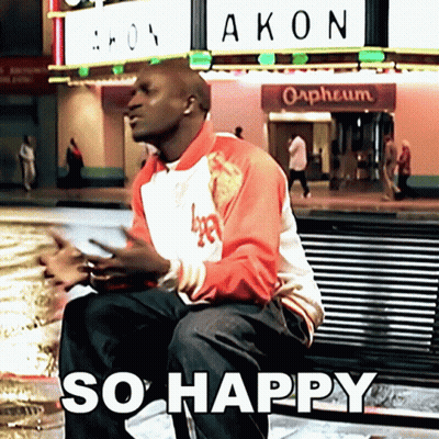 Man Sitting on Bench in Front of Akon Orpheum