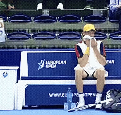 Man Sitting On Bench With European Open GIF