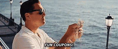 Man Sitting On Boat Holding Money Saying Fun Coupons GIF