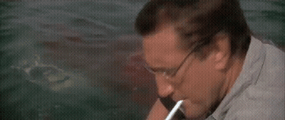 Man Sitting On Boat Looking At Bell GIF