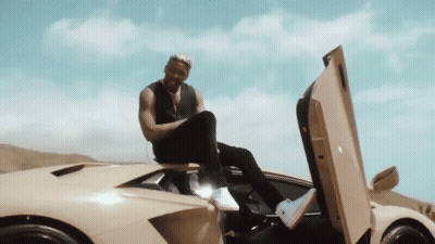 Man Sitting On Car Hood GIF