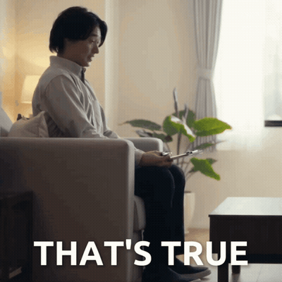 Man Sitting On Couch Behind True GIF