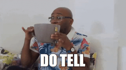 Man Sitting On Couch Drinking Tea GIF