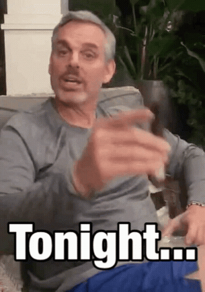 Man Sitting On Couch Holding Glass Saying Tonight GIF