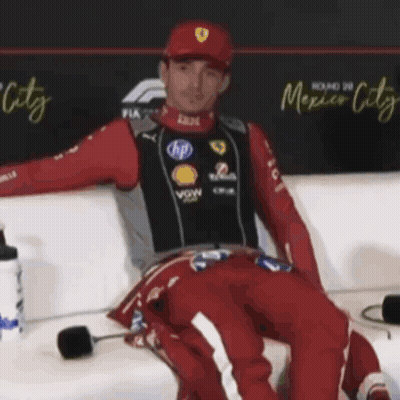 Man Sitting On Couch In Front Of Mexico City Wall GIF