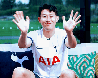 Man Sitting On Couch In White AIA Jersey GIF