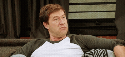 Man Sitting On Couch In White Shirt GIF