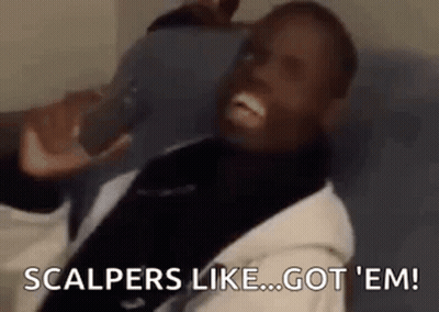 Man Sitting On Couch Laughing At Phone GIF