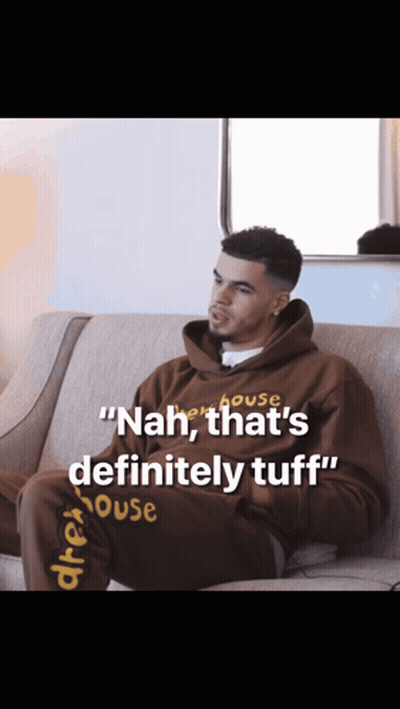 Man Sitting on Couch Nah That's Definitely Tuff