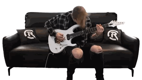 Man Sitting On Couch Playing Guitar Sticker
