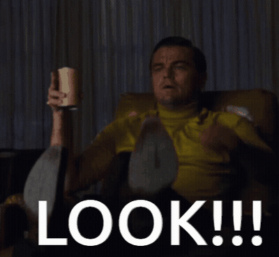 Man Sitting On Couch Pointing At Look GIF