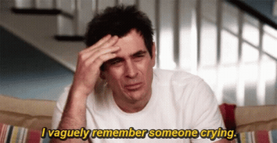 Man Sitting On Couch Remembering Crying GIF