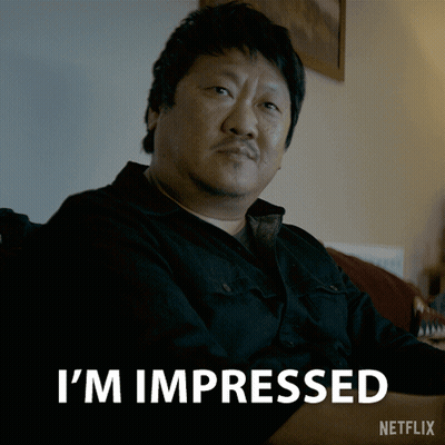 Man Sitting On Couch Saying I'm Impressed GIF