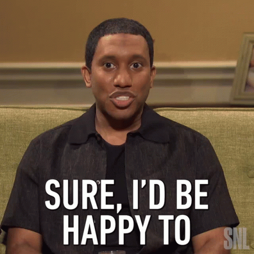 Man Sitting On Couch Saying Sure I'd Be Happy To Snl GIF
