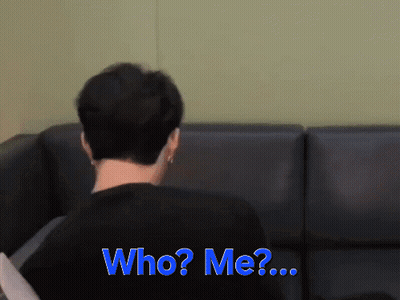 Man Sitting On Couch Saying Who Me GIF