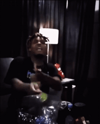 Man Sitting On Couch With Chips GIF