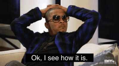 Man Sitting On Couch With Hands On Head GIF