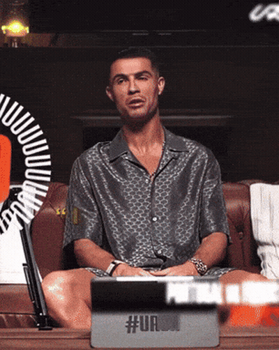 Man Sitting On Couch With Legs Crossed In Front Of Tablet #Ur GIF