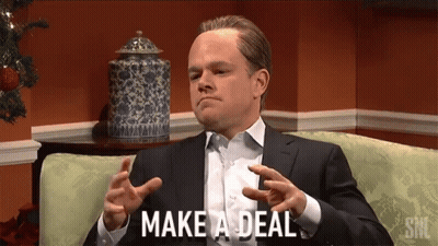 Man Sitting On Couch With Make A Deal GIF